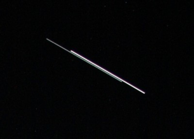 The ISS (brighter trail on the right) closely followed by the space shuttle.